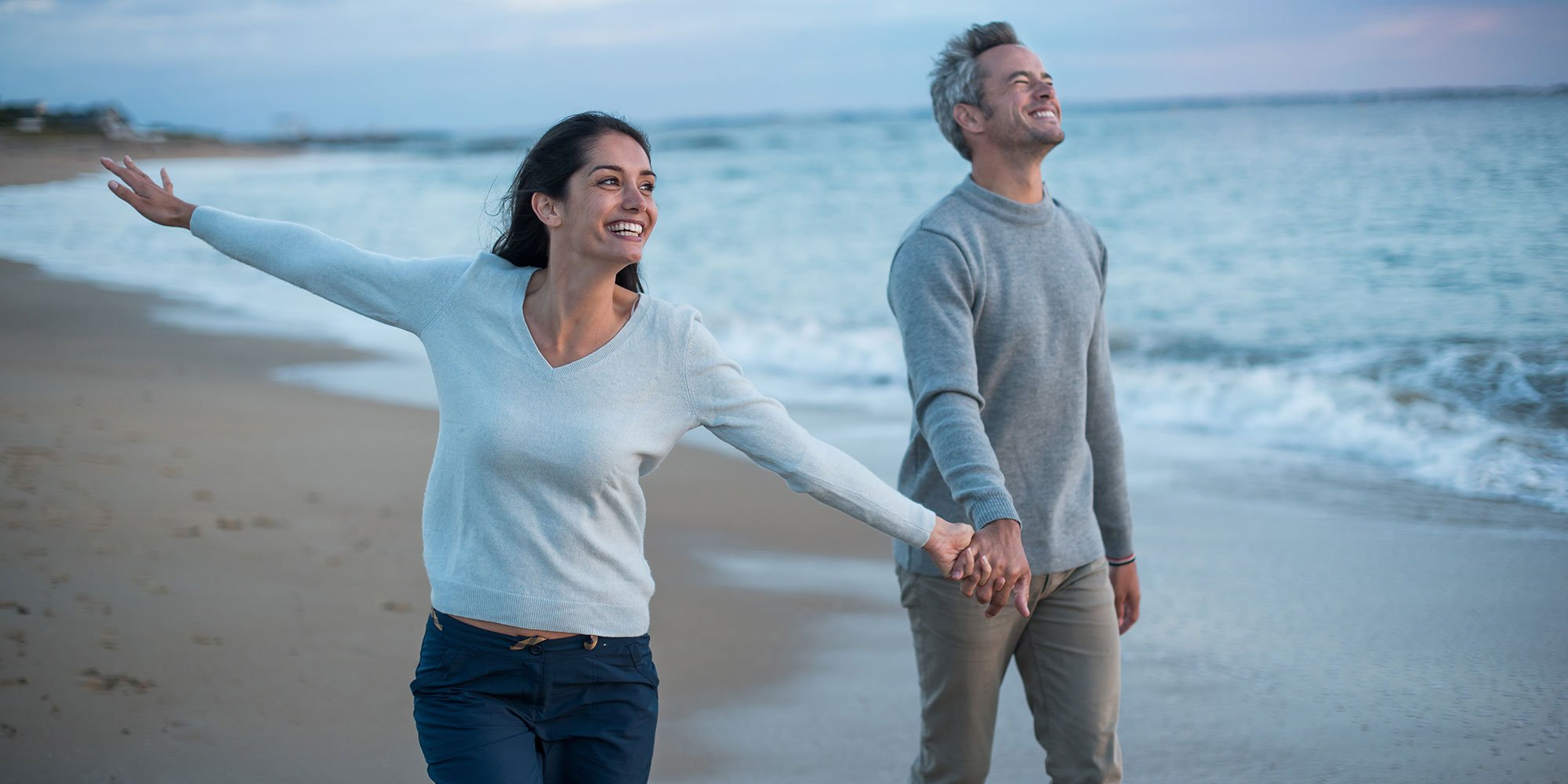 retired couple on beach